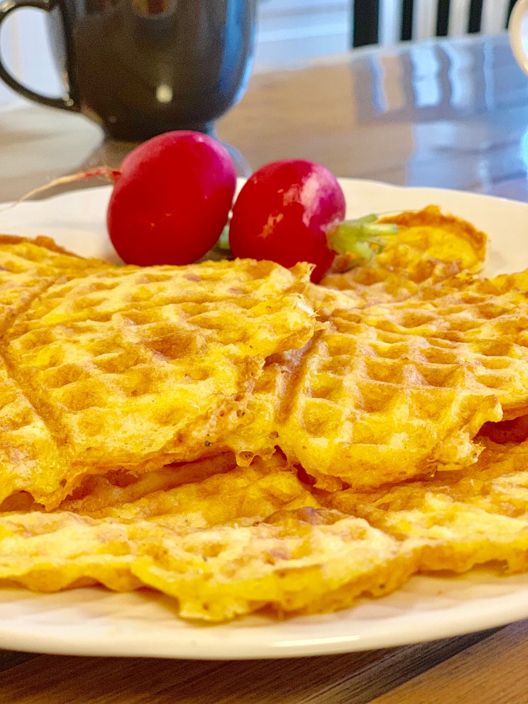 Photo of savory keto waffles with cheese and chicken and ham