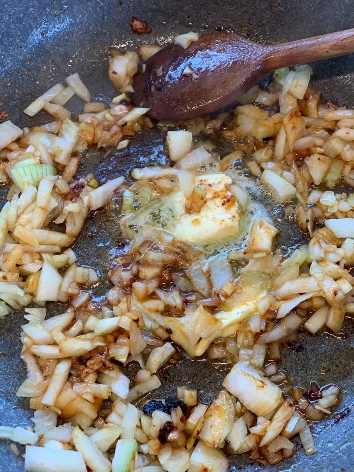 Picture of onion and butter on the stove