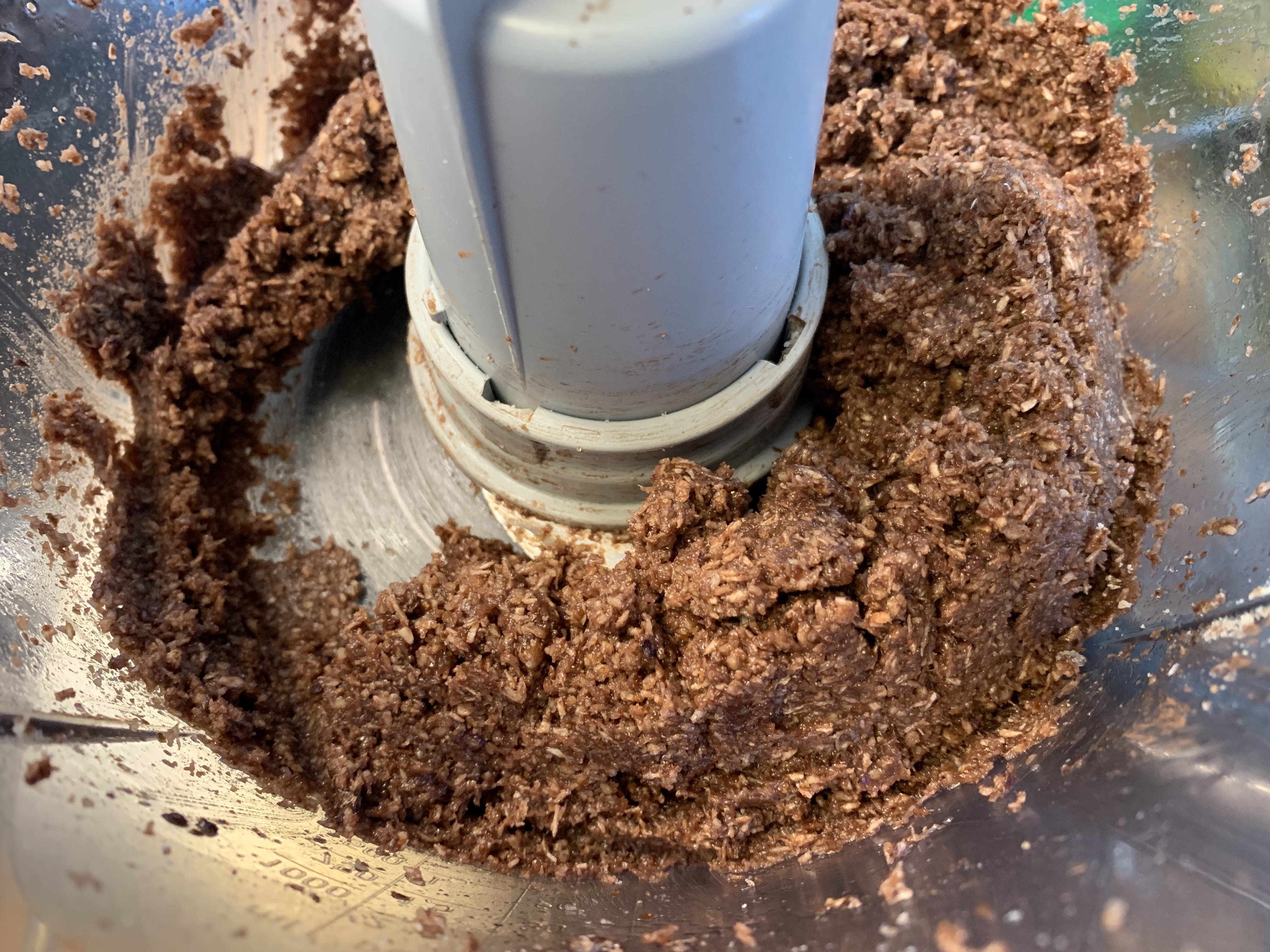 Picture of steps to make crust for raw keto chocolate cheesecake