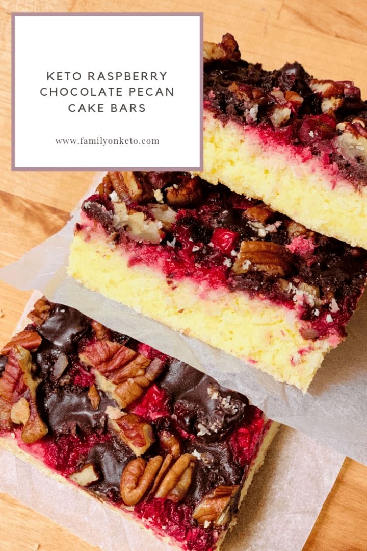 Keto raspberry chocolate pecan cake bars on a parchment paper