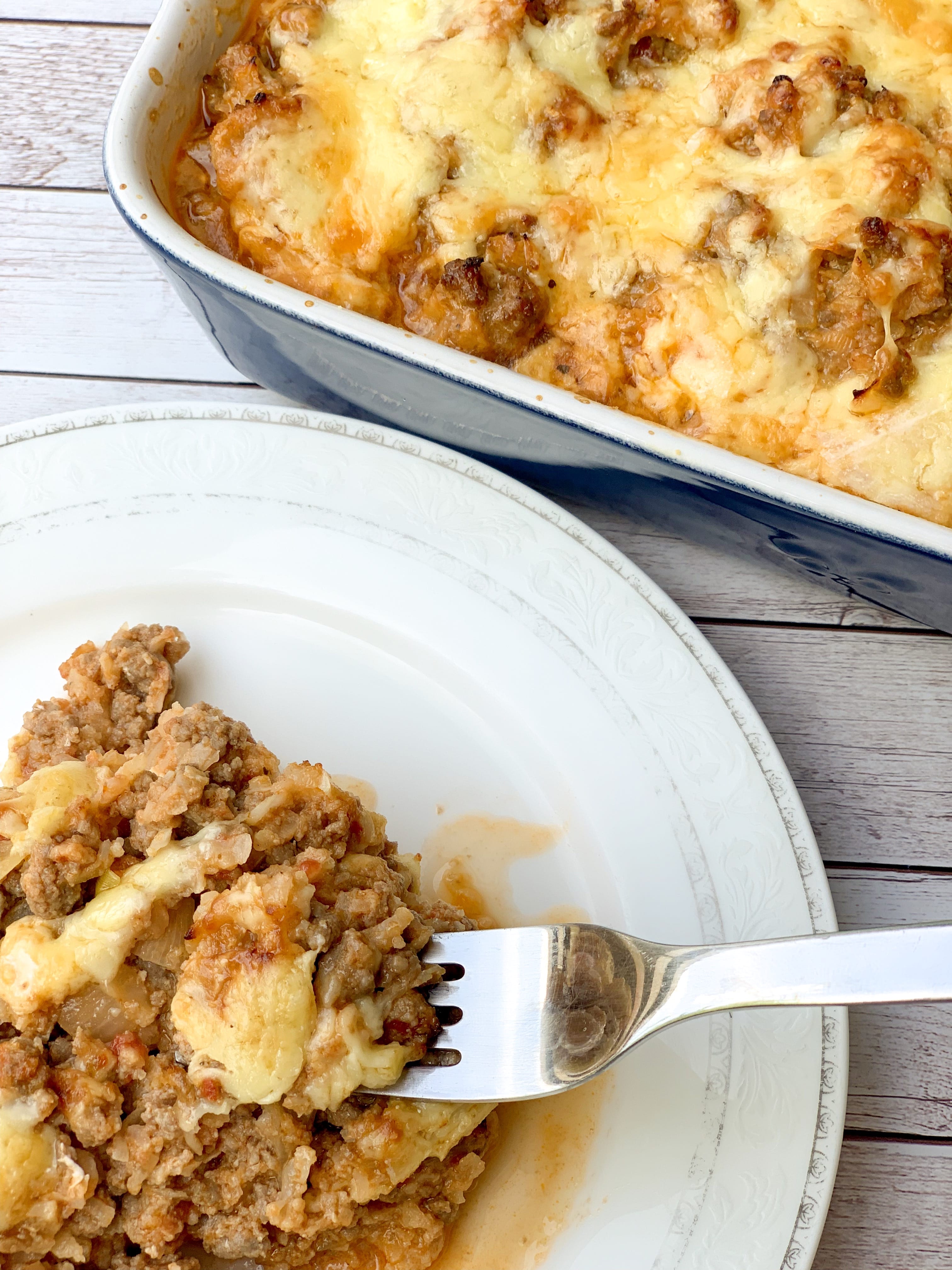 Picture of keto beef casserole with cauliflower on the table, served in a plate