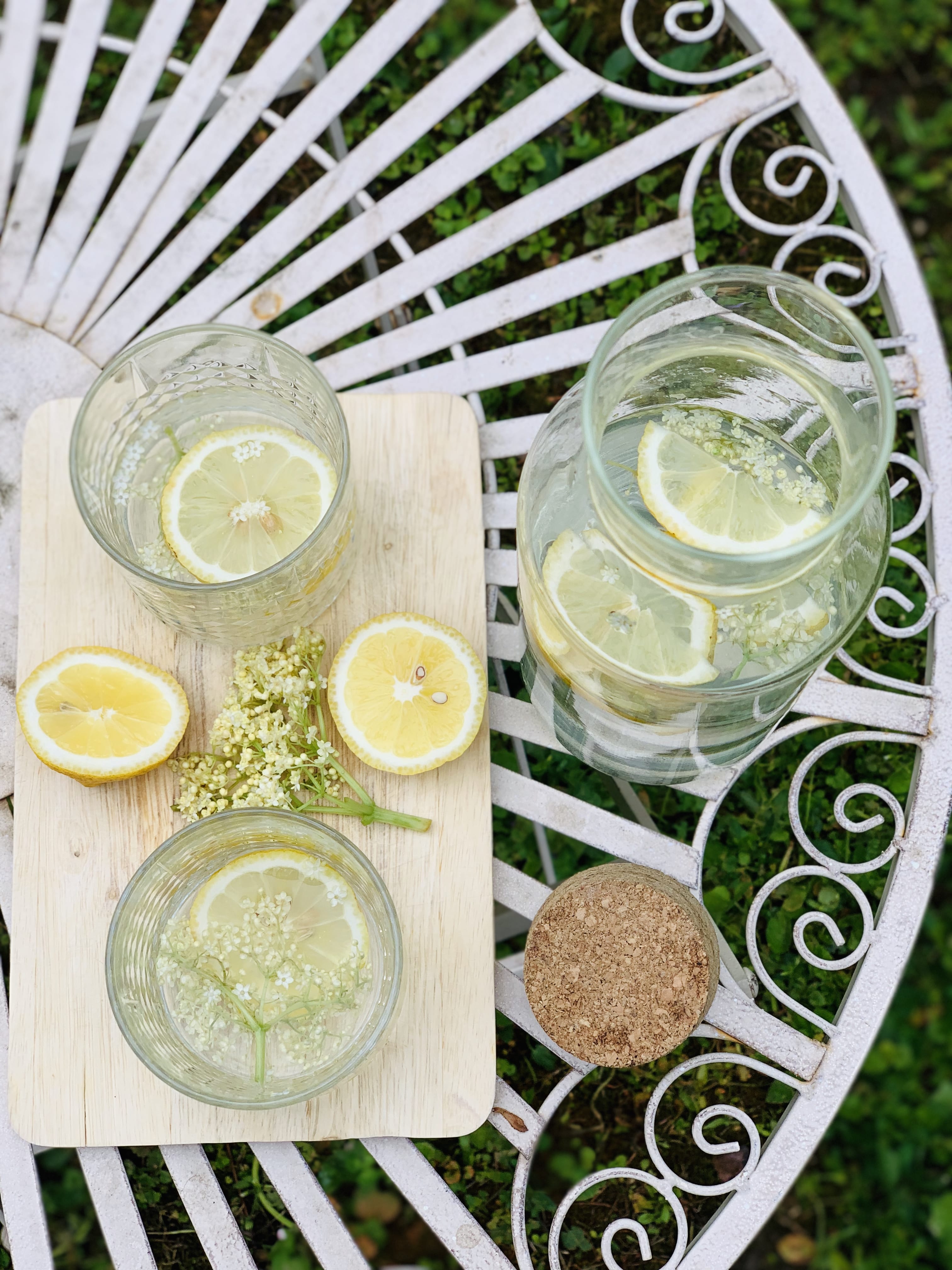 Picture of elderflower syrup drink on the garden table