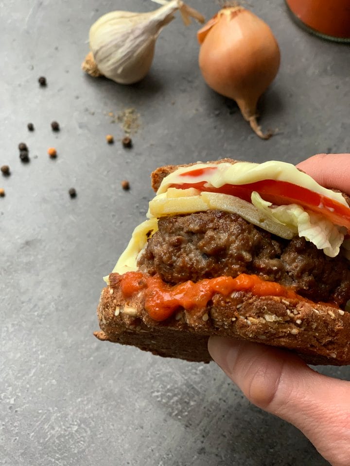 Picture of low carb beef burger in a keto bread