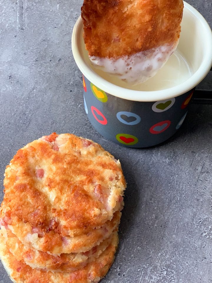 Picture of keto bacon bread dipping in yogurt