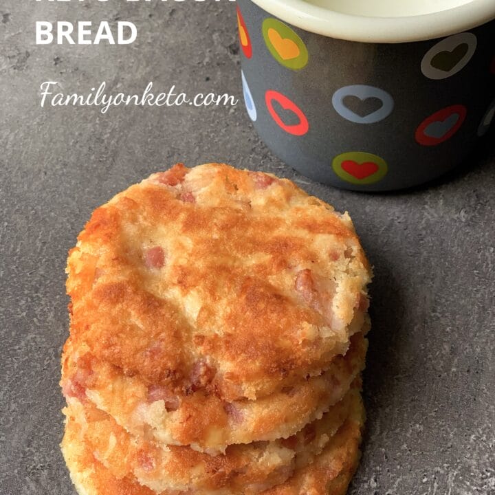 Picture of keto bread with bacon and cheddar cheese on the table with yogurt