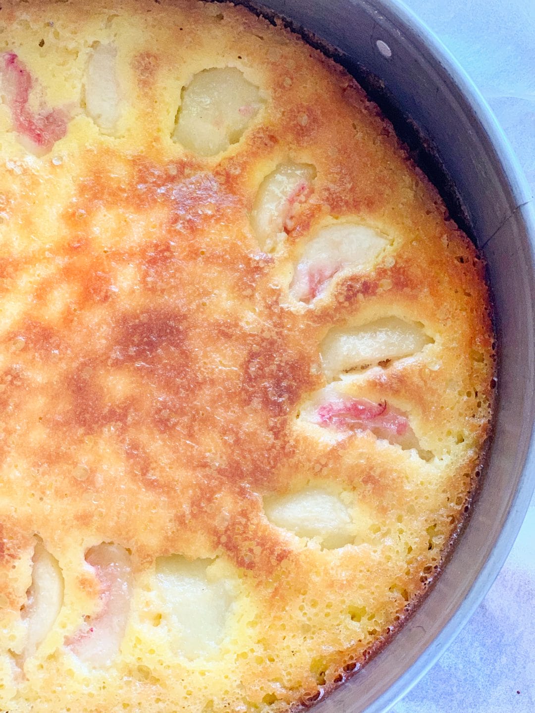 Picture of peach cake in the baking tray