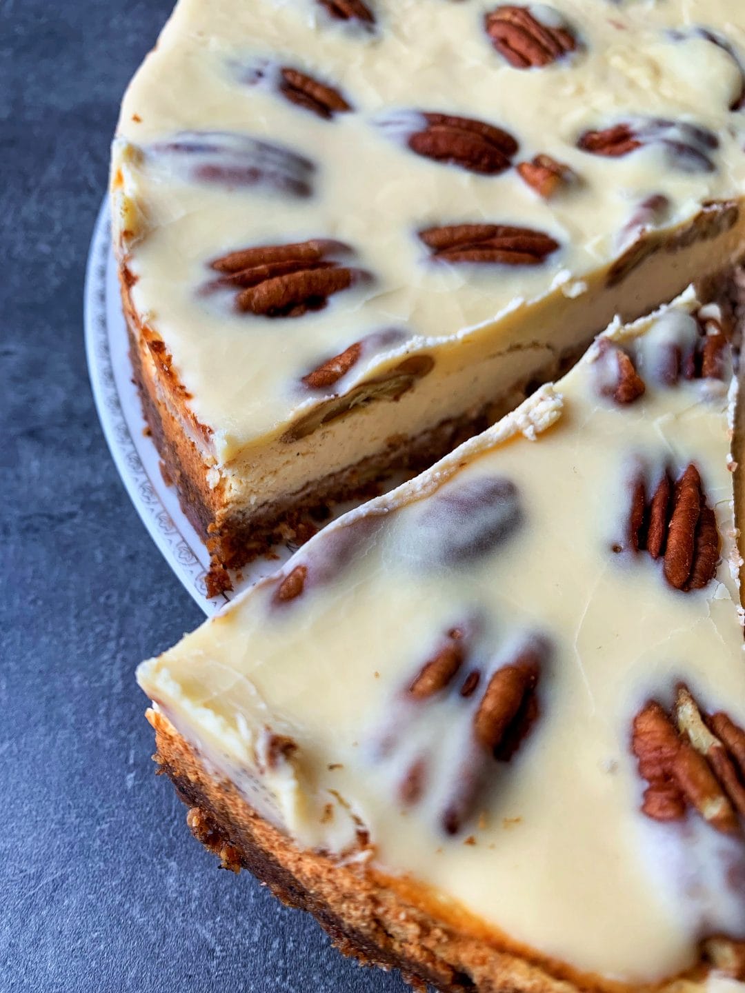 Photo of low carb pecan pie cheesecake with keto caramel topping with erythritol