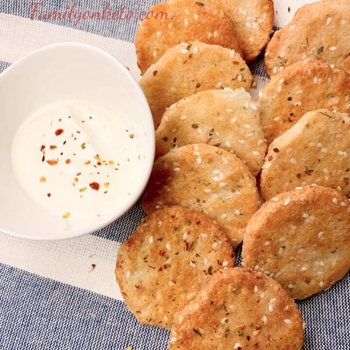 Picture of keto crackers without eggs on the table with low carb sour cream dip
