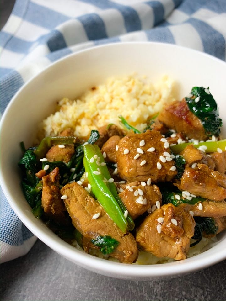 Low carb pork tenderloin with spinach and oyster sauce in Thai style