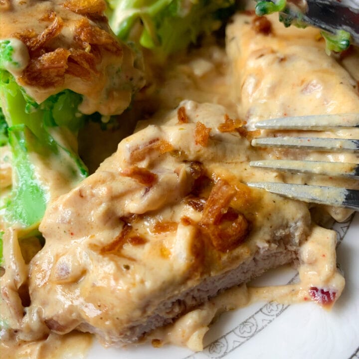 Picture of low carb veal steaks with caramelized onion sauce and steamed broccoli