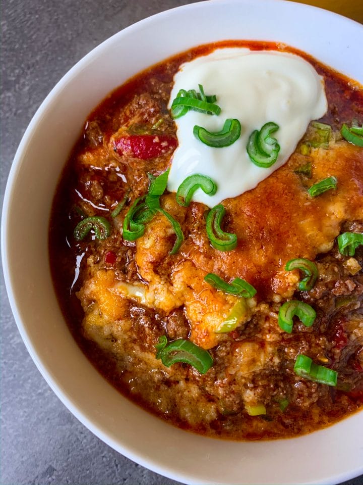 Low carb chili con carne with cheese crust in a bowl