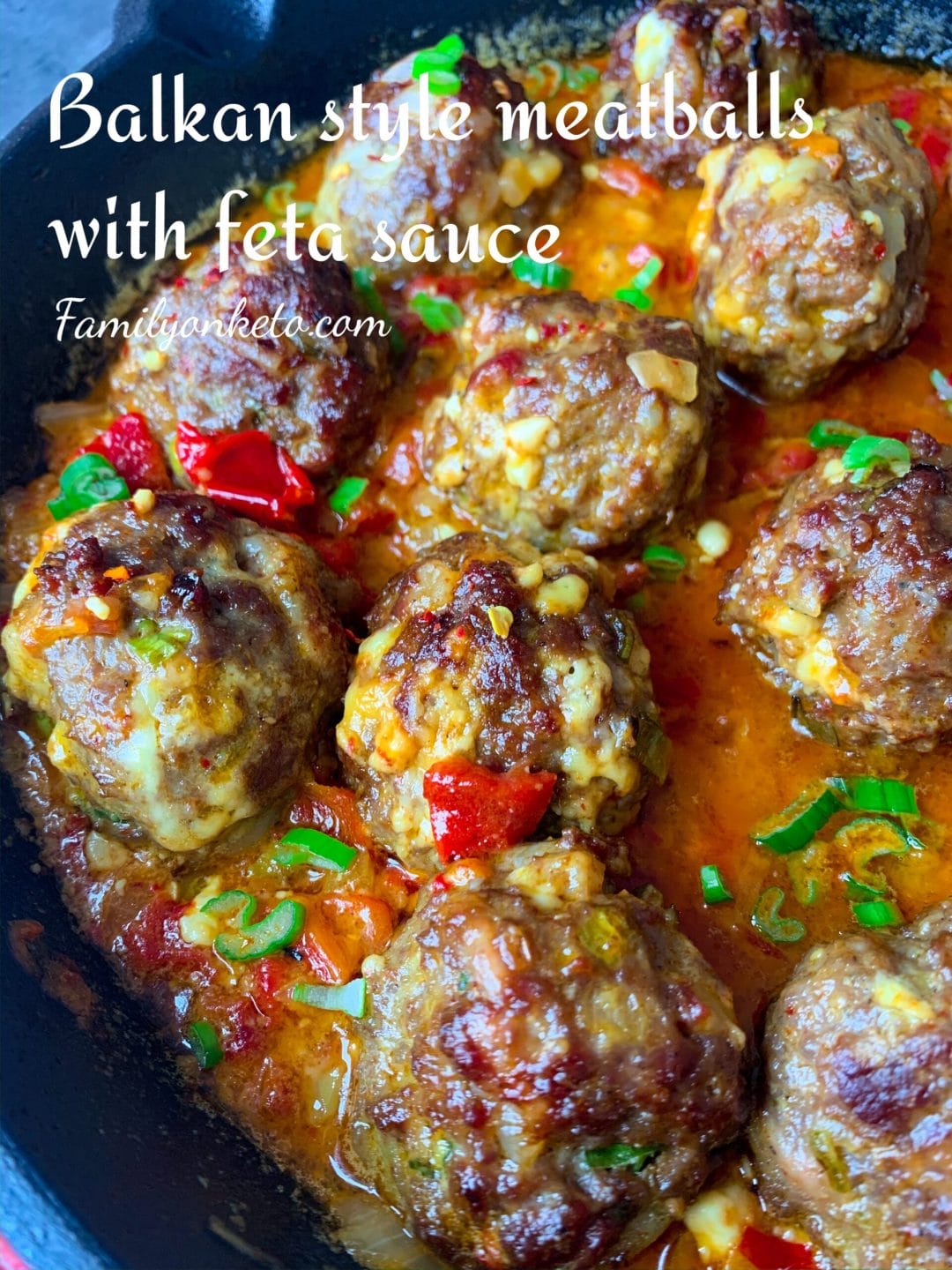 Picture of Balkan style meatballs with feta cheese sauce. Delicious keto meatballs recipe.