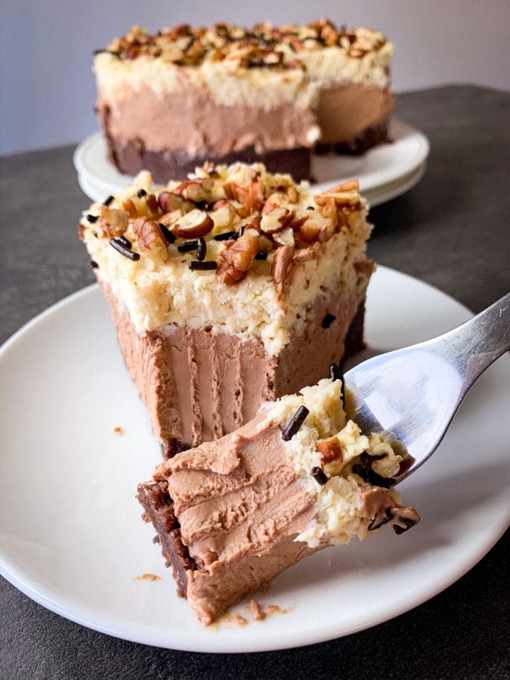 Picture of a delicious slice of rich and flavorful keto German chocolate cheesecake
