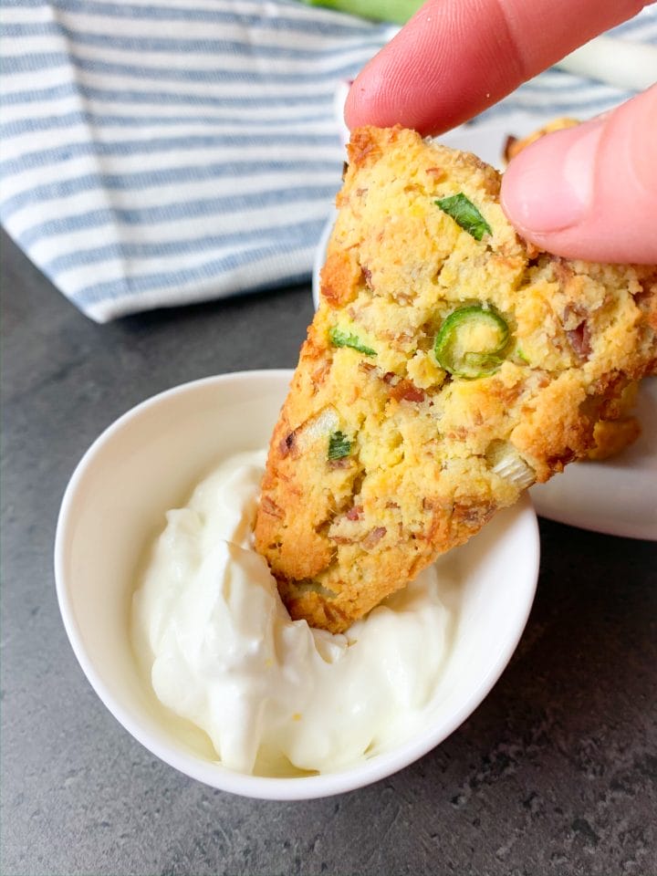 Picture of dipping the keto scone into a sour cream dip