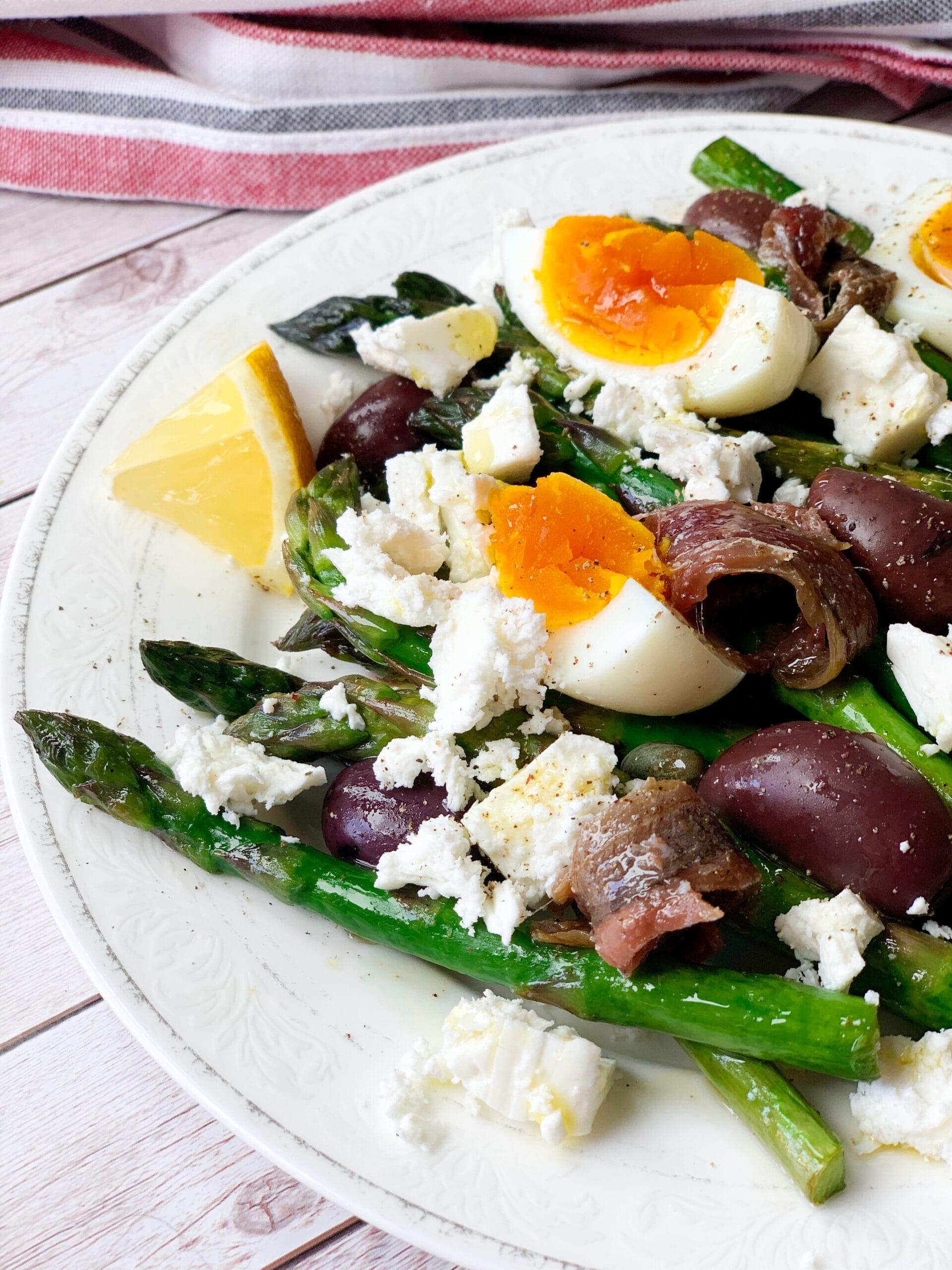 Picture of low carb asparagus salad seasoned with leon and extra virgin olive oil