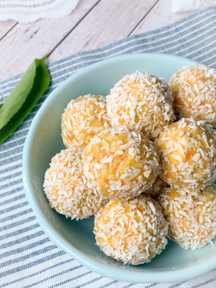 Picture of no bake keto energy balls with carrot, cream cheese and coconut or carrot cheesecake energy balls 