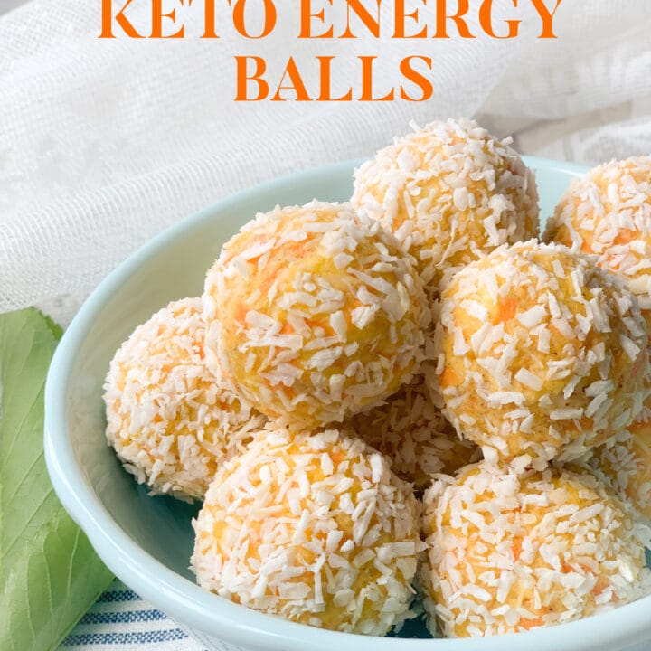 Picture of a bowl with carrot cake keto energy balls with coconut flakes