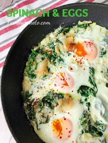 Picture of a skillet with keto spinach and eggs