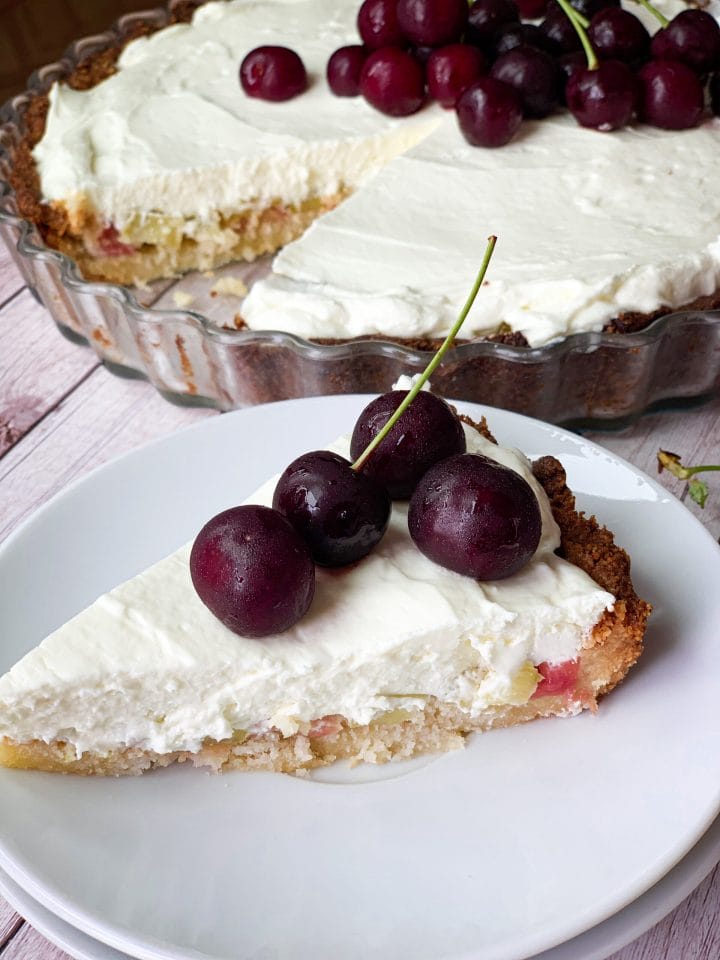 Low carb rhubarb pie with cheesecake topping and tart cherries