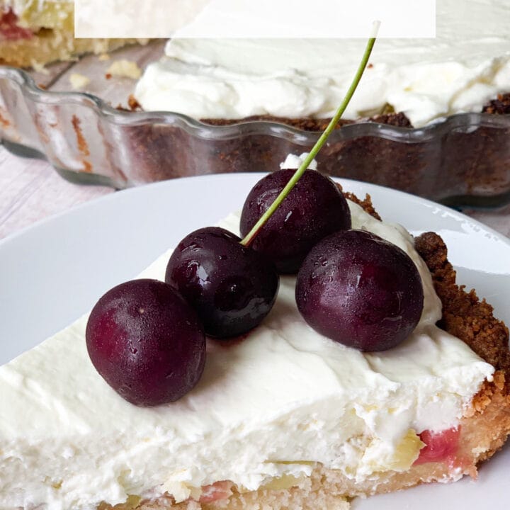 Picture of keto rhubarb cheesecake with cherries on top