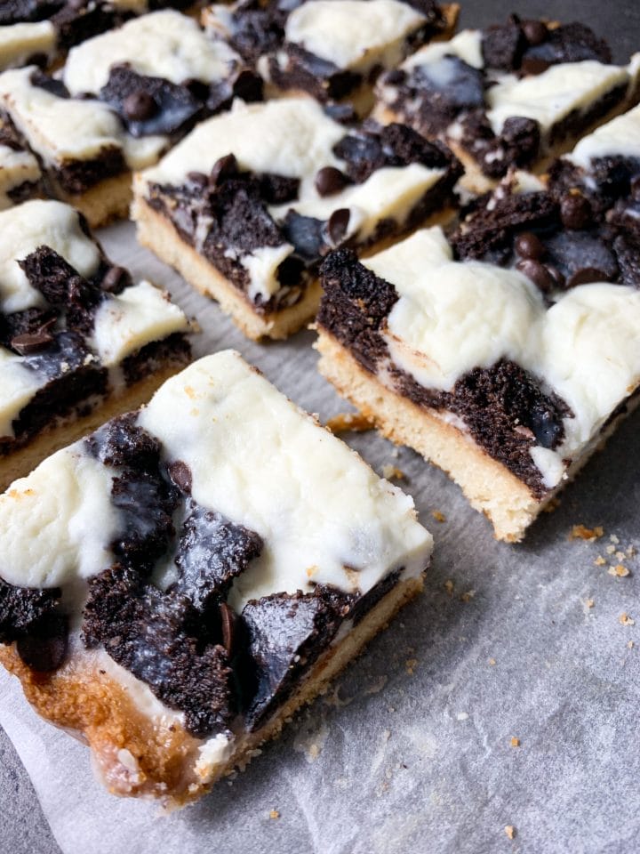 Picture of crispy keto magic cookie bars with keto Oreo topping