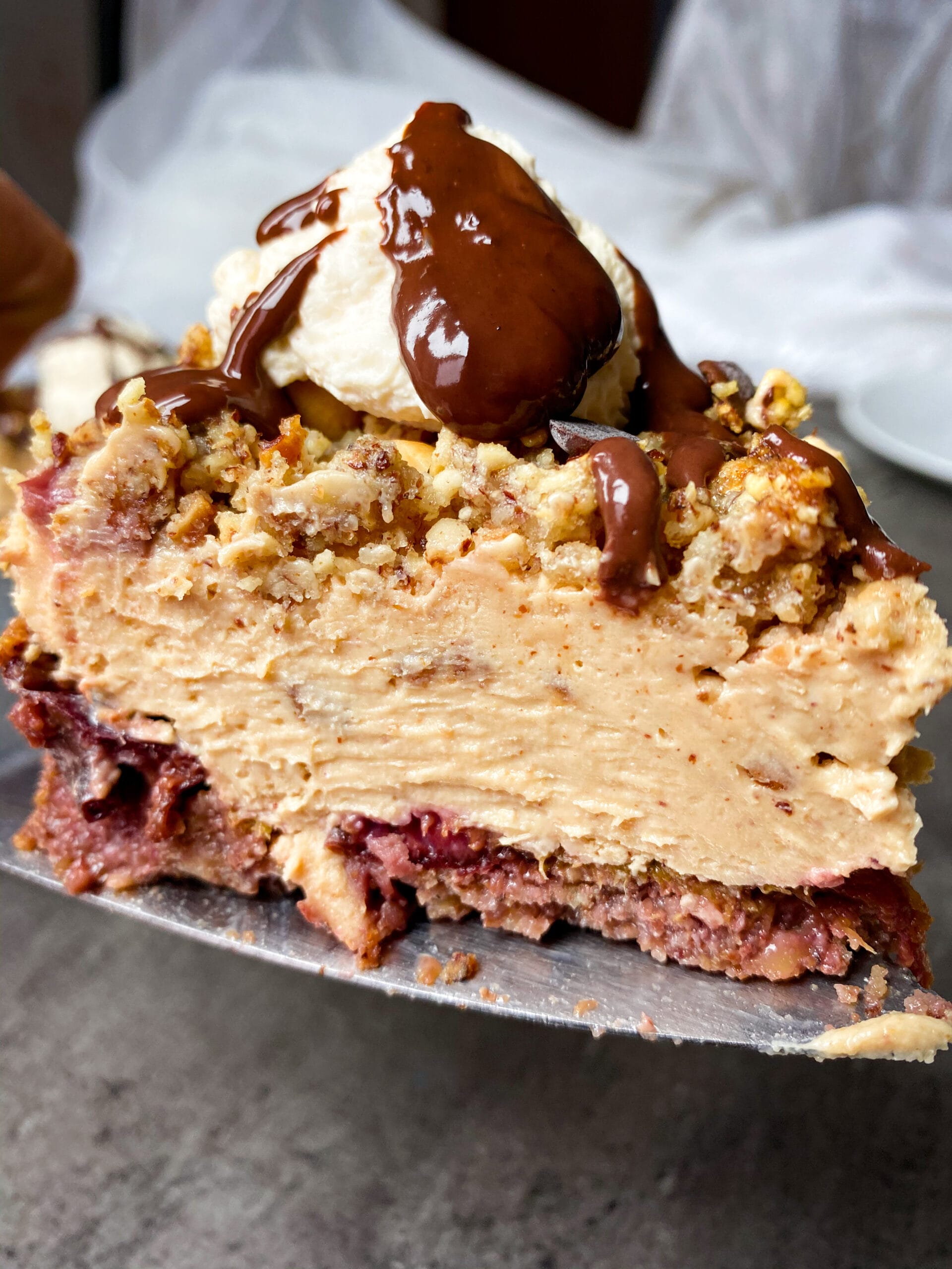 Picture of a slice of keto peanut butter and jelly pie