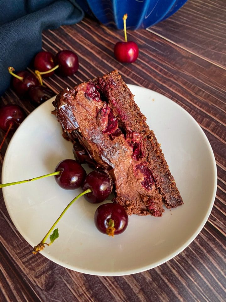 Picture of a slice of keto cherry chocolate cheesecake 
