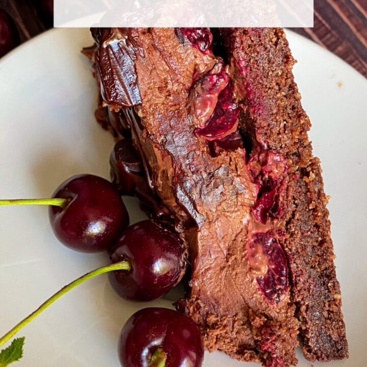 Picture of a slice of keto chocolate cherry cheesecake