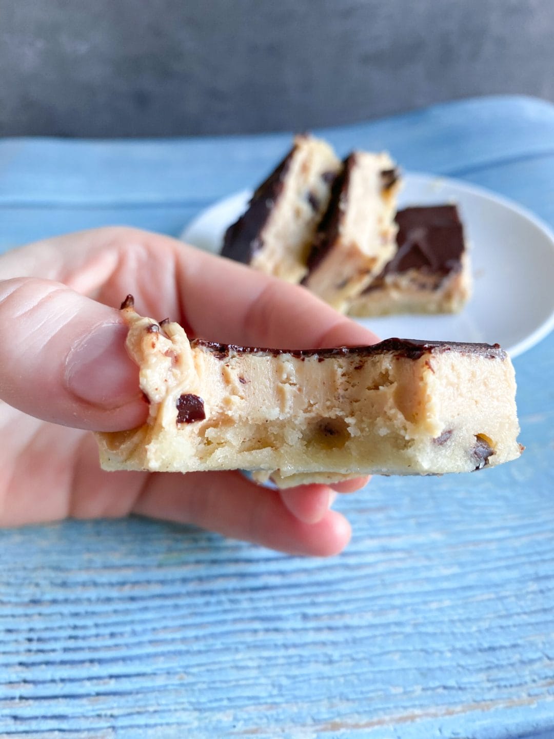 Picture of low carb no bake cookie dough cheesecake bars with peanut butter