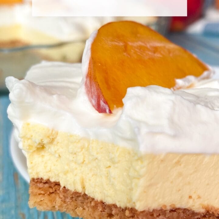Slice of keto peach cream pie with cream and a slice of peach on top